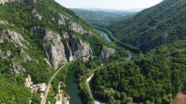 Drone View of Ovcar Kablar Gorge in Serbia, West Morava River, Road and Railway in Green Landscape
