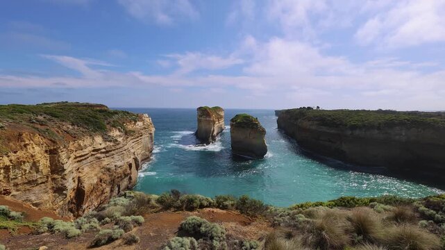 Panoramic view of Tom and Eva limestone rock stacks off Loch Ard Gorge on the Great Ocean Road coast Victoria Australia, Twelve Apostles National Park