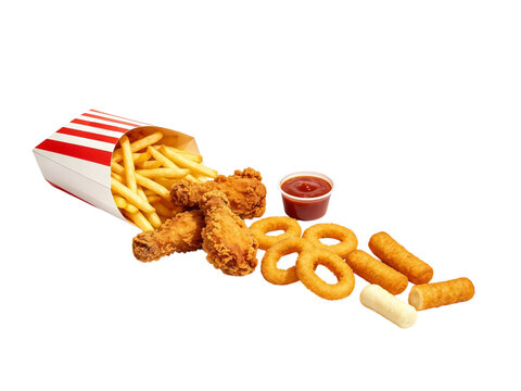 Delicious crispy fast food combination with french fries fried chicken drumsticks golden onion rings mozzarella cheese sticks and tomato ketchup sauce