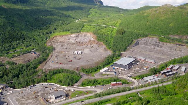 Aerial view of massive data center construction site located in green mountain valley in Bjerkvik, Norway