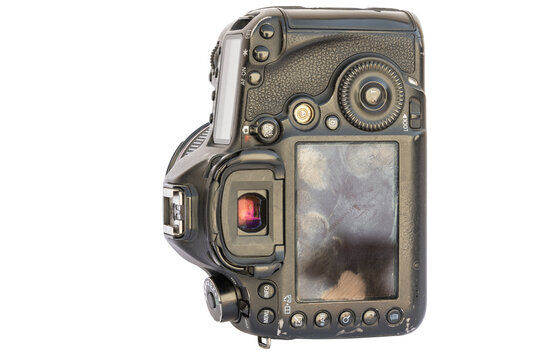 Top-Down View of Worn Professional DSLR Camera on White Background