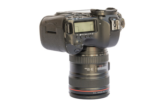 Professional Digital Camera with Zoom Lens on White Background