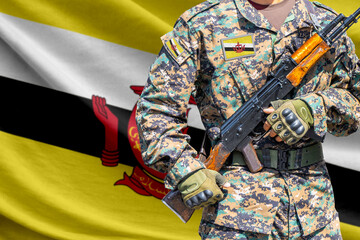 Obraz premium Brunei Darussalam flag with soldier holding assault rifle