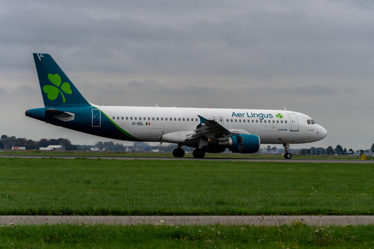 Aer lingus Airplane landing at schiphol Airport. Amsterdam, The Netherlands.