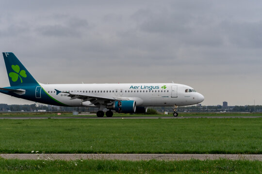 Aer lingus Airplane landing at schiphol Airport. Amsterdam, The Netherlands.