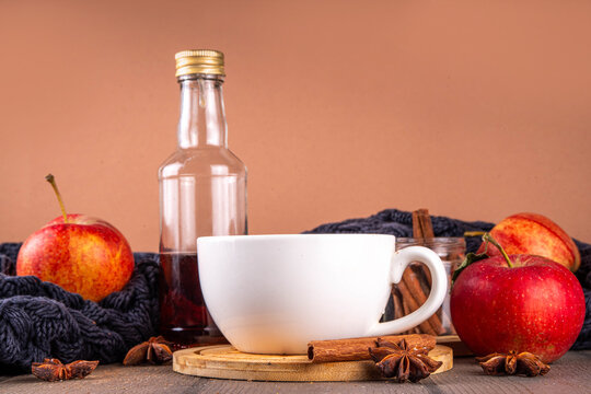 Sweet autumn apple spice coffee latte, warm autumn drink with strong coffee, creamer, fall spices - cinnamon, nutmeg, ginger, cloves, tasty cozy warming beverage