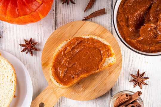 Homemade Spiced Pumpkin Butter, Tasty vegetable smooth, flavorful fall spread for toasts and sandwiches. Delicious pumpkin puree with fall seasonal spices