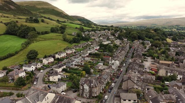Sedbergh Cumbria UK. Aerial Video sedbergh.Sedbergh sɛdbərbər or locallyˈsɛbər is a town and civil parish in the Westmorland and Furness area of the ceremonial county of Cumbria