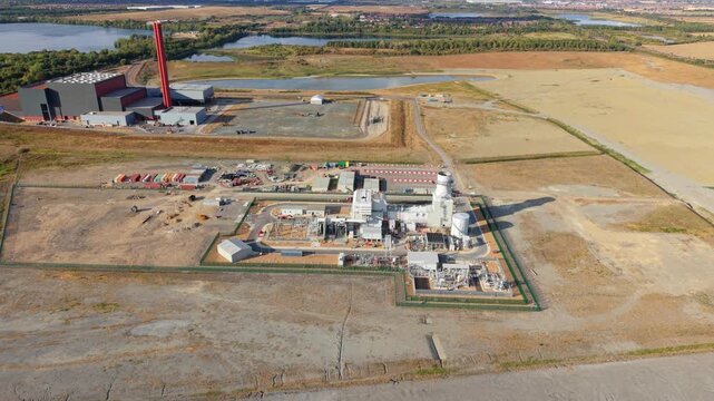 Aerial view of Rookery South ERF and Millbrook Power plant with industrial buildings and infrastructure in Stewartby, England, United Kingdom.