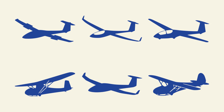 Set of blue silhouettes of various glider airplanes in flight