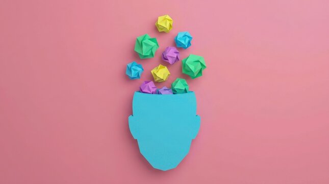 3D rendered illustration of colorful geometric crystals and polyhedral shapes pouring into a large light blue human head silhouette against a solid pink background