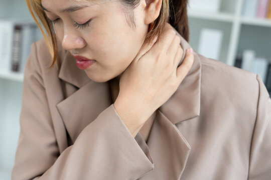 office syndromes, woman massaging neck pain due to work and using a computer, digital composite of a focused spine of neck pain and shoulder pain symptoms , injuries, health care, medical, myositis