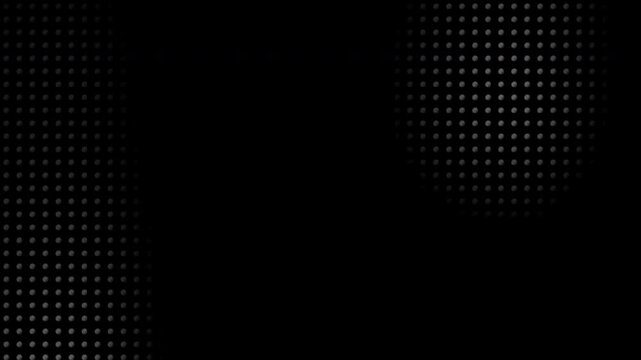 Dark perforated metal texture reveals moving shadows on black mesh. Abstract dot matrix surface creates futuristic minimalist cyber grids. Sleek industrial backdrops show smooth subtle motion loops