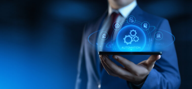 Businessman Holding smartphone with Automation Process Icons on Screen. Business and Industry concept