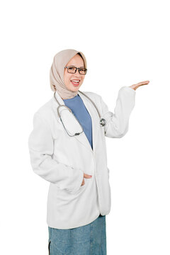 Friendly Asian Muslim Female Doctor in Hijab Presenting Copy Space with Open Hand
