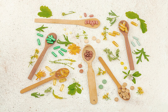 Plant based supplements, natural vitamins, fresh herbs and flowers. Organic ingredients medication