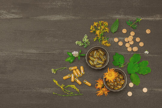 Plant based supplements, natural vitamins, fresh herbs and flowers. Organic ingredients medication
