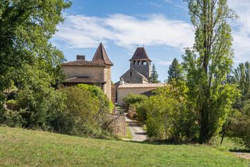 Fototapeta premium Scenic rural landscape view of ancient Saint Avit village in summer, Lacapelle-Biron, Lot-et-Garonne, France - Birthplace of potter Bernard Palissy
