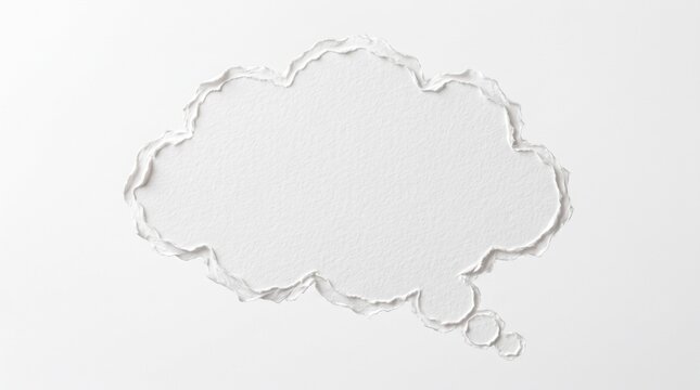 White torn paper thought bubble cloud shape with ragged ripped edges and blank copy space for a text isolated on clean minimal white background