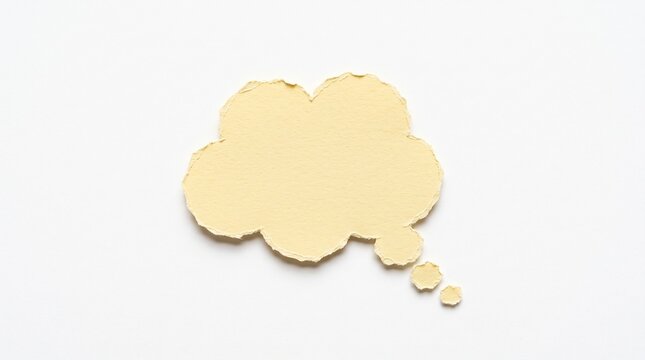 A single light yellow torn paper thought bubble shape isolated on a plain white background for creative communication and design ideas concepts