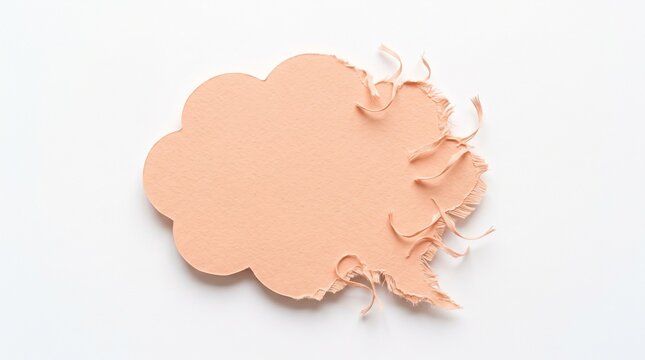 Pastel peach paper speech bubble cutout with rough torn frayed edges isolated on clean white background for your creative text design