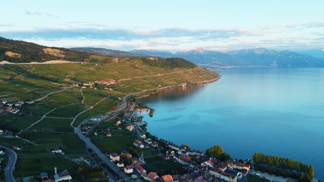 Aerial view of the terraced vineyards of Cully overlooking Lake Geneva in Bourg-en-Lavaux, Vaud, Switzerland.