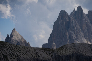 Obraz premium Mountain landscape panorama Tre Cime Mount against a blue summer background. 