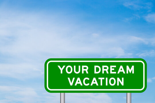 Green color transportation sign with word your dream vacation on blue sky with white cloud background