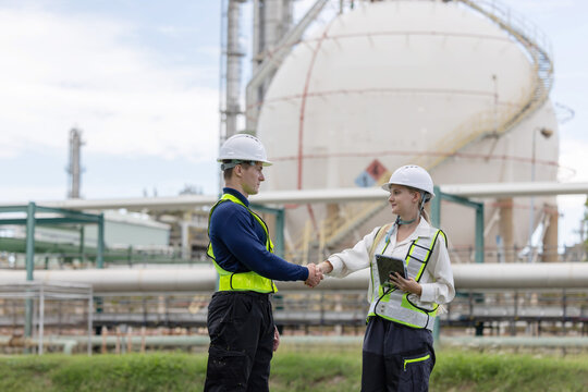 Two petroleum engineers having a handshake after meeting