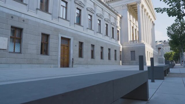 Smooth Gimbal Tracking Shot Along Restored Rear Facade and Columns of Austrian Parliament Building, Vienna