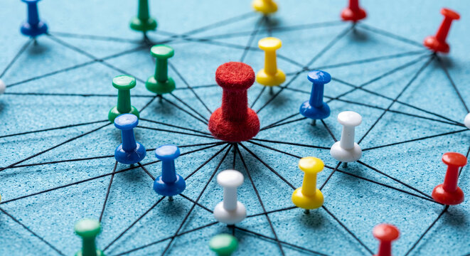 Network of connected pushpins on a blue background symbolizing e-commerce store location mapping.