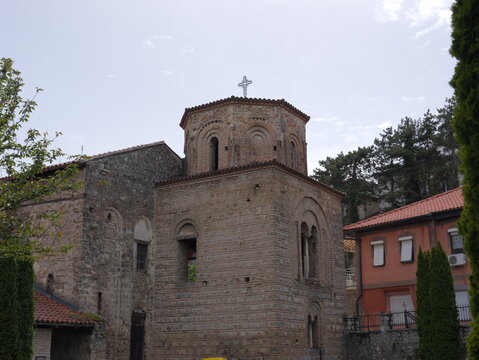 View of the historic Church of Saint Sophia with its ancient brick and stone architecture and a cross on the dome in Ohrid, Municipality of Ohrid, North Macedonia.