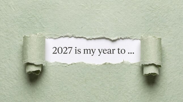 Torn green paper revealing the text 2027 is my year to, new year goals, resolutions and motivation concept for planning, personal growth, success and a fresh start in the new year
