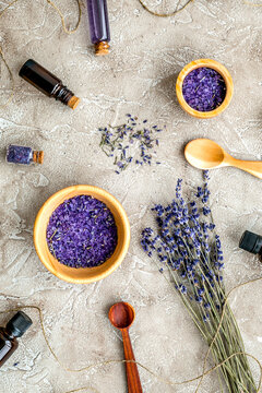 Essential oil and lavender salt with flowers top view