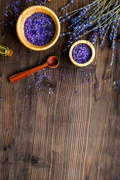 organic cosmetics with lavender on wooden background top view