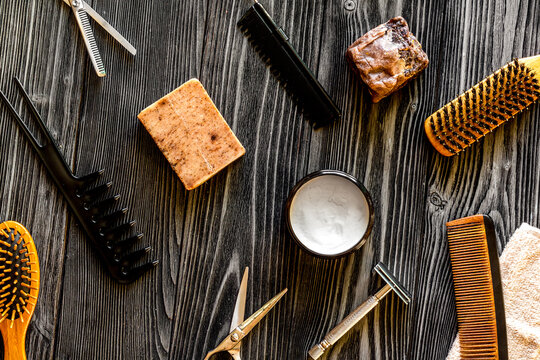 Tools for cutting beard barbershop top view on wooden background