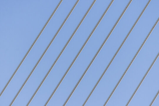 Parallel lines against blue sky abstract design