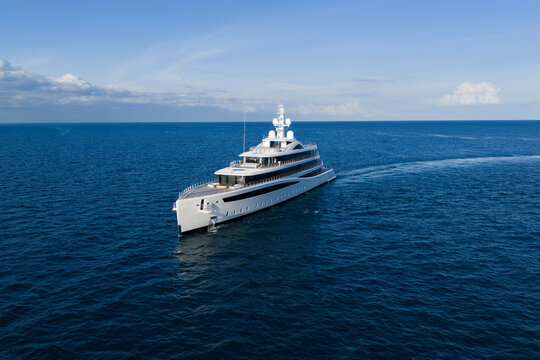 Aerial view motorboat. Luxury lifestyle. Vacation on summer. Yacht at sea. Motorboat aerial top view. Luxury boat motor yacht at sea. Yachting boat tourism. Motorboat gliding through the sea