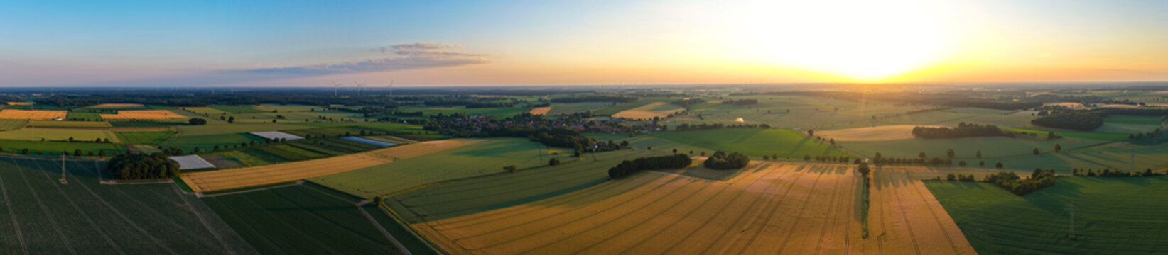 Panoramic agricultural land and natural landscape. Panoramic aerial field. Aerial field panorama. Farming landscape panorama. Aerial rural countryside landscape with farmland field, ecology