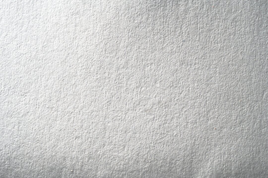 white paper texture background with subtle rough surface and soft neutral tone. 
