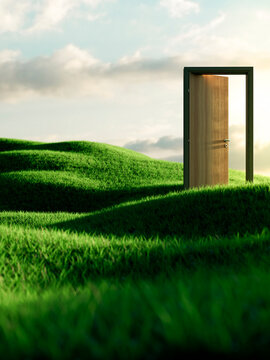 A conceptual open wooden door standing alone on a tranquil green meadow under a bright sky