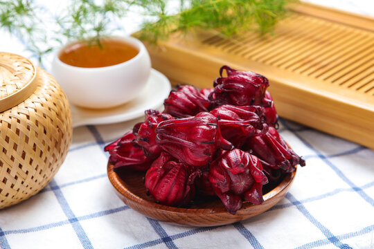 Fresh Roselle Hibiscus Flowers In Wooden Bowl For Herbal Tea