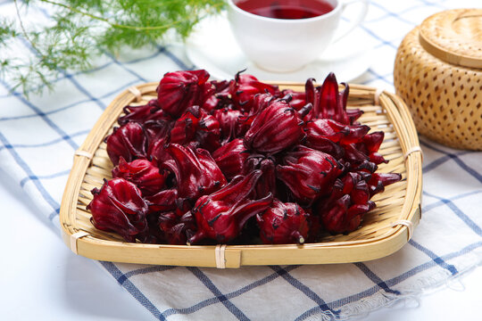 Fresh Roselle Hibiscus Flowers In Wooden Bowl For Herbal Tea