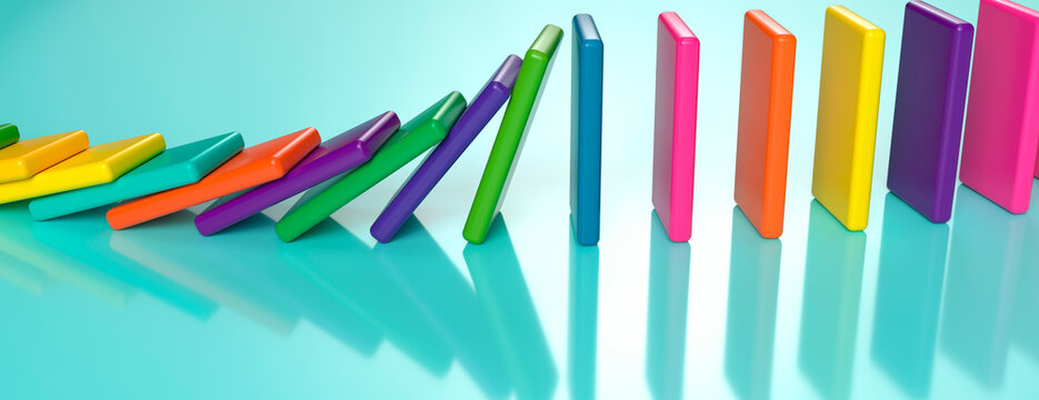 Colorful dominoes falling in a row on a bright cyan surface with soft reflections and shadows