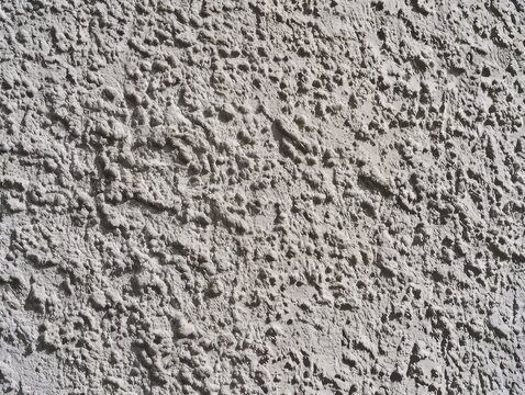 Rough textured gray concrete wall surface
