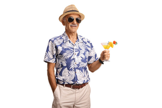 Smiling senior man holding a cocktail