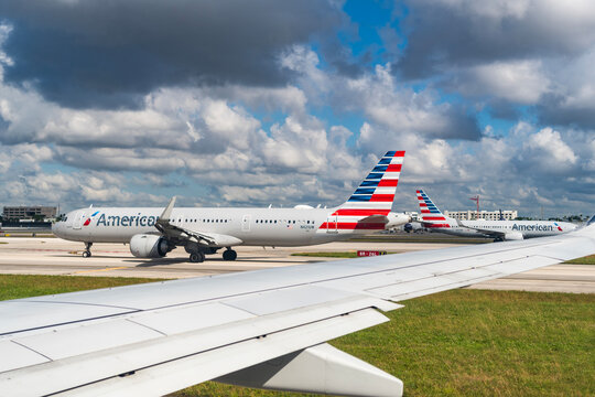 Miami, Florida, USA - October 22, 2025: Plane departure American airline. Departure and arrival at airport. Airplane terminal for airline. American airlines plane departure airport. Airport terminal