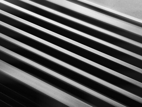 Black and white diagonal abstract metal stripes