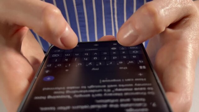 User inputting text questions and prompt text fields into an artificial intelligence chatbot app. Human hands typing on a virtual keyboard panel to communicate with generative neural model