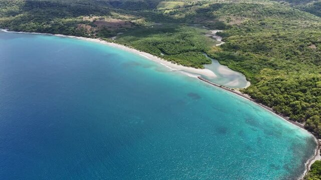 Aerial view of Playa Cabuyal coastline and turquoise waters in Guanacaste, Costa Rica